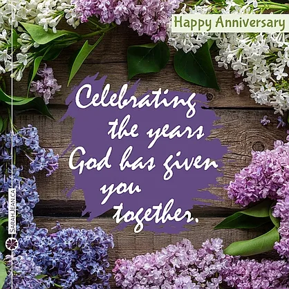 Free SarahJean eCard with a Christian message entitled 'The Years'. Image of pink and purple flowers laying in a circle on wooden planks.