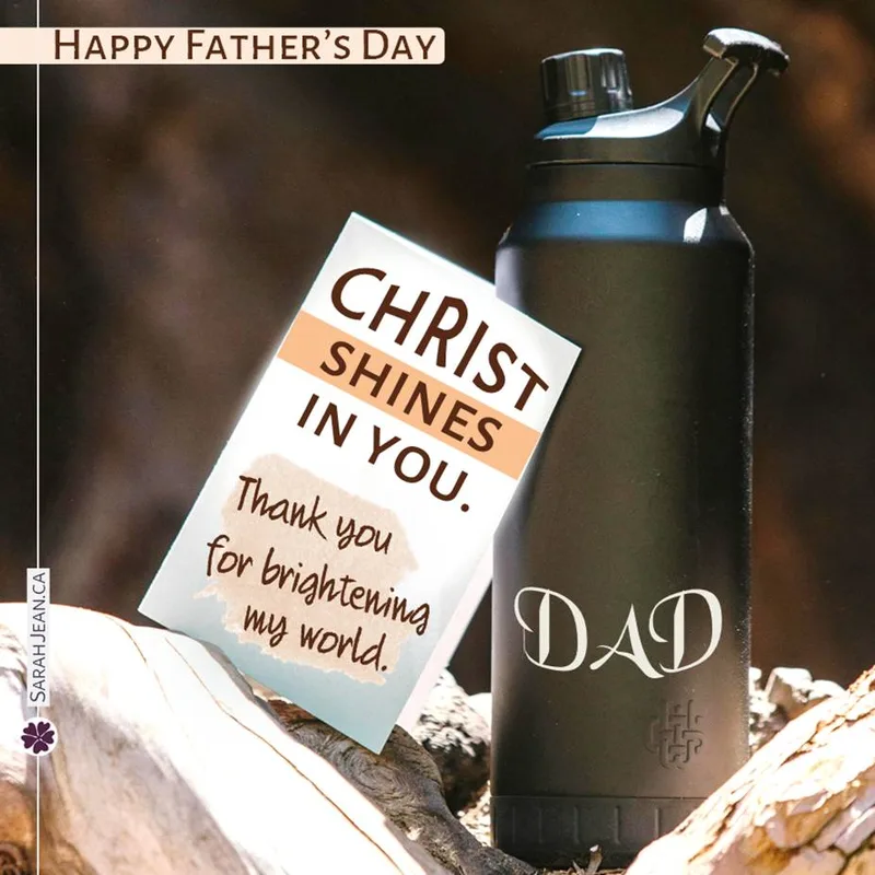 Free SarahJean Father's Day eCard with a Christian message entitled 'Christ Shines'. Image of greeting card and water bottle on tree stump.